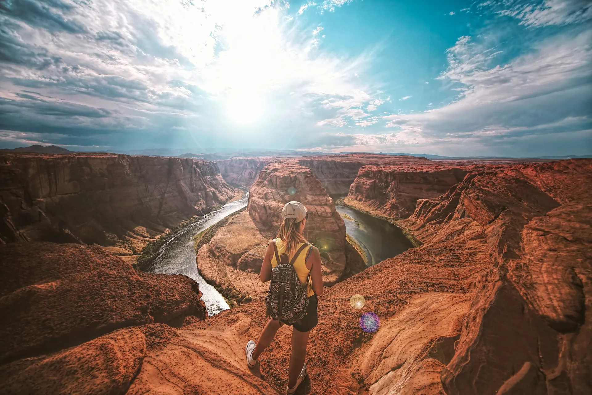 Traveler overlooking canyon river with Eazy Communication global connectivity