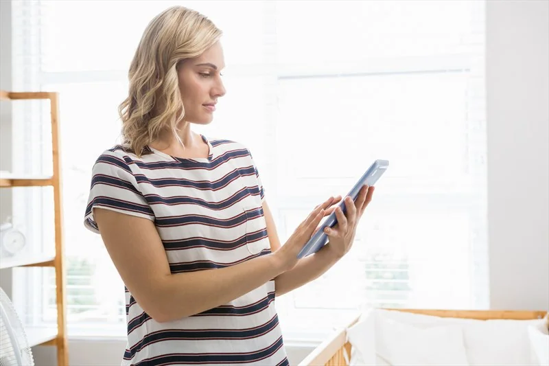 Traveler choosing data plan on tablet